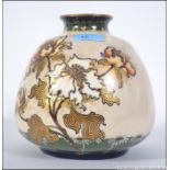 A Turn Vienna art nouveau style vase with white ground decorated with floral spray stamped to the
