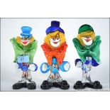 A collection of three retro circa 1960's Murano studio glass clowns,