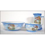 An early 20th century Staffordshire matching transfer printed wash set consisting of wash bowl,