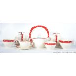 A stunning retro 1960's Midwinter stylecraft tea service in white and red polka dots comprising