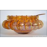 A boxed vintage 20th century Carnival glass iridescent gold Princess punch set, containing bowl,