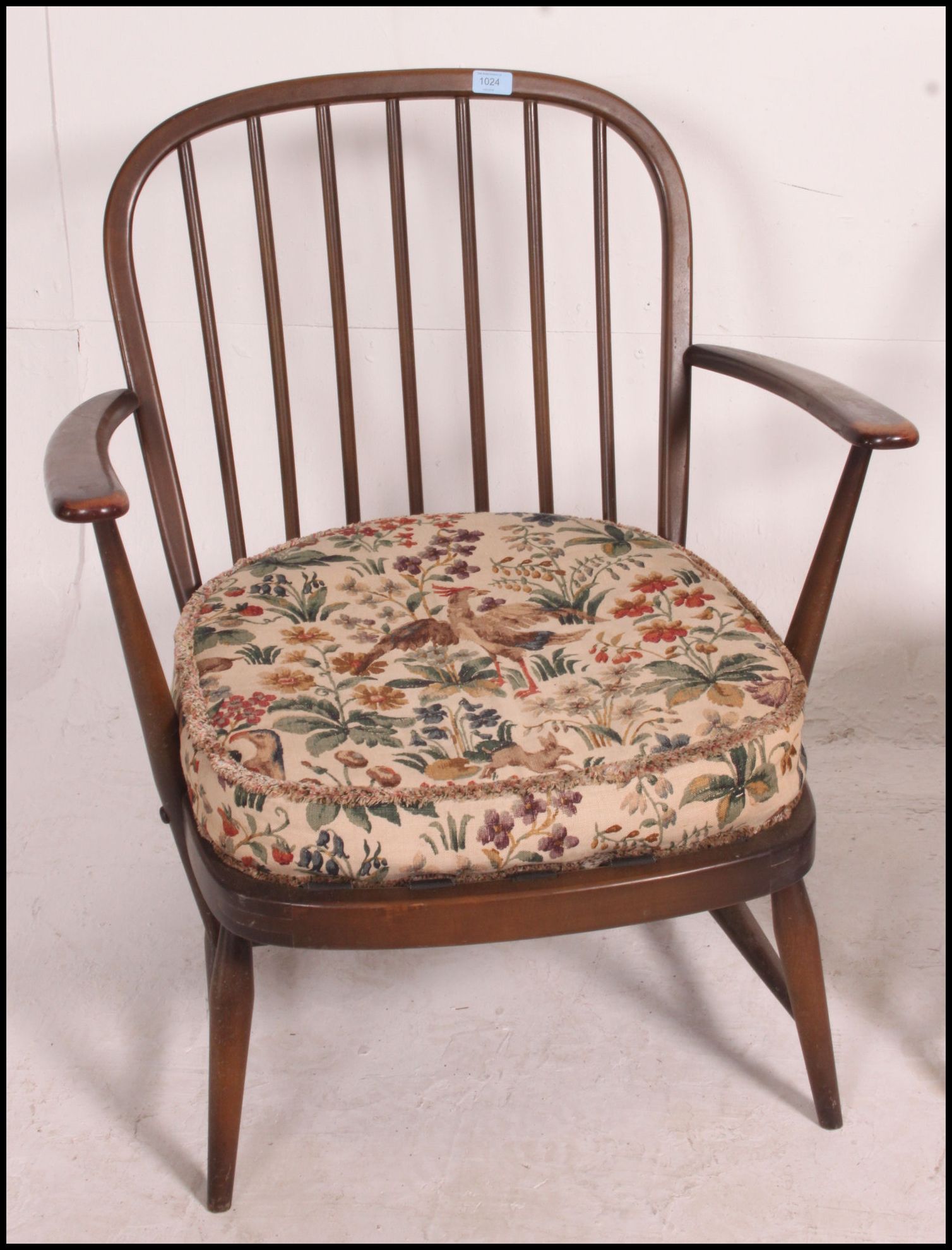 A pair of Ercol beech and elm windsor pattern armchairs complete with the cushions. - Image 3 of 4