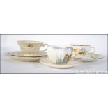 A Shelley china cup and saucer RD 723404 retailed by Lawleys together with a Bavarian trio and a