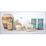 A collection of ceramics to include a Clarice Cliff cup and saucer, a Shelley Vase,