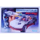 TERMINATOR 2: An original vintage Kenner made Terminator 2 ' Mobile Assault Vehicle ' boxed toy.