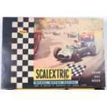 SCALEXTRIC: A vintage boxed Scalextric GP33 racing set.