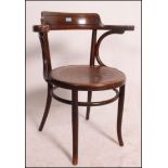 A Bentwood 1930's cafe chair having embo