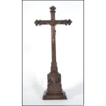 A 19th century carved oak crucifix - cro