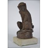 An early 20th century bronze figurine of