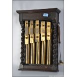 A vintage wall hanging xylophone, having