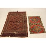 A Turkomen rug on red ground with centra