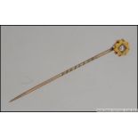 A Victorian 9ct gold and diamond stick p