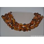 Amber style glass bead necklace, 6 strin