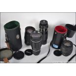 A collection of camera lenses to include
