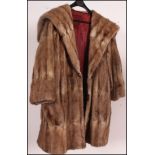 A collection of 3 fur coats dating to th