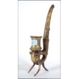 An unusual bronze / brass water pipe in