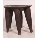 An African Nupe tribal stool of classic