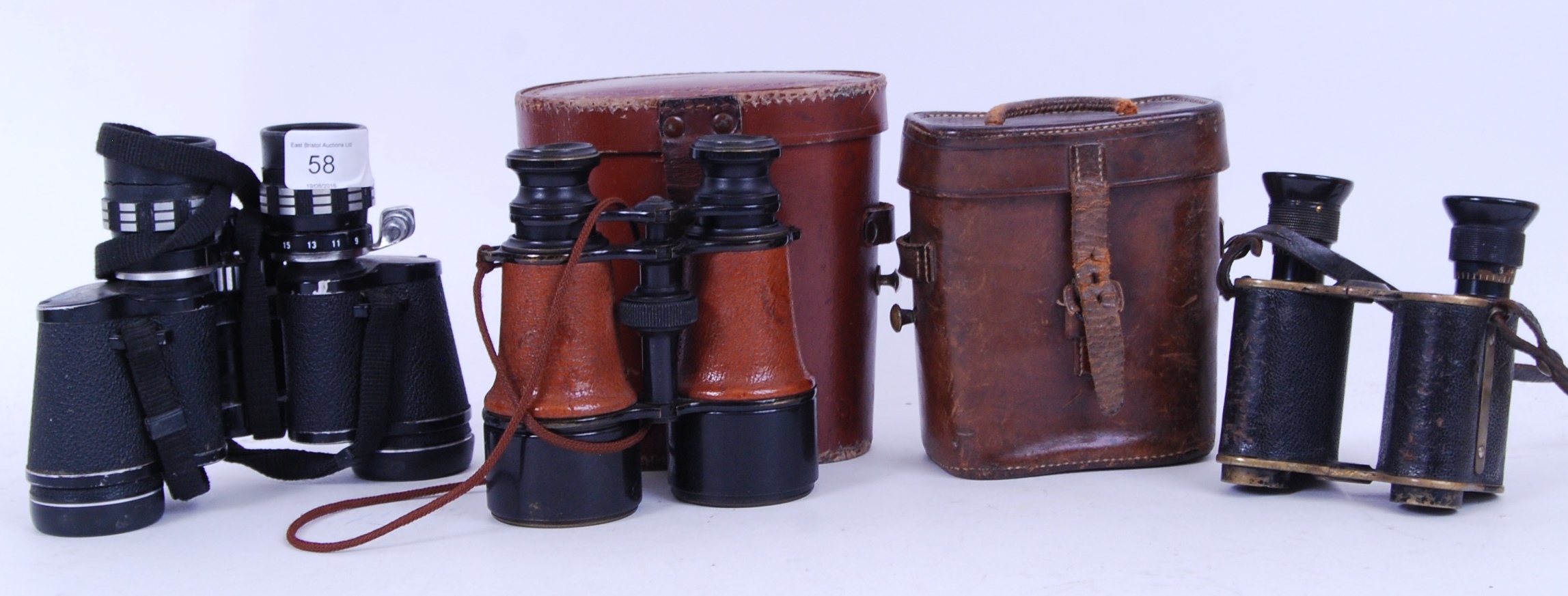 BINOCULARS: A collection of 3x pairs of binoculars to include a WWI unusual pair of JC Carr Ellison