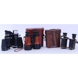 BINOCULARS: A collection of 3x pairs of binoculars to include a WWI unusual pair of JC Carr Ellison