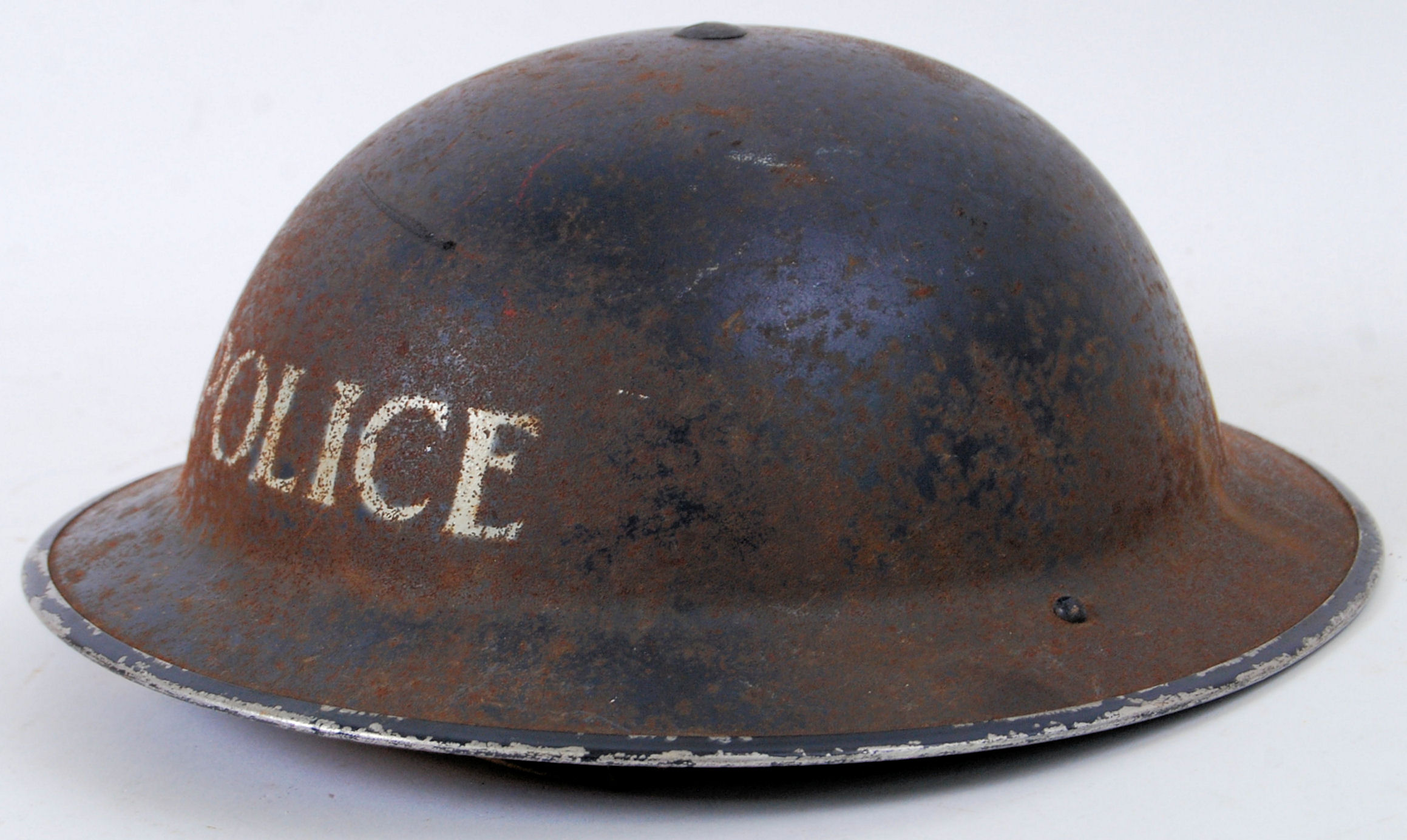 POLICE HELMET: A WWII Second World War era British Police tin helmet,