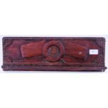 HOLT HILL: An unusual rare 19th century carved wooden pipe rack,