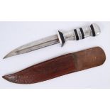 DAGGER: An unusual likely WWII Second World War period dagger with white metal and blackened handle.