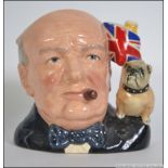 A Royal Doulton character jug modelled as Winston Churchill by Stanley James Taylor, number D6907,