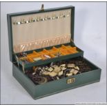 1980's green leatherette jewellery casket filled with mixed costume jewellery to include, 1 watch ,
