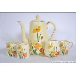 A Crown Staffordshire part coffee tea service comprising cups, saucers,