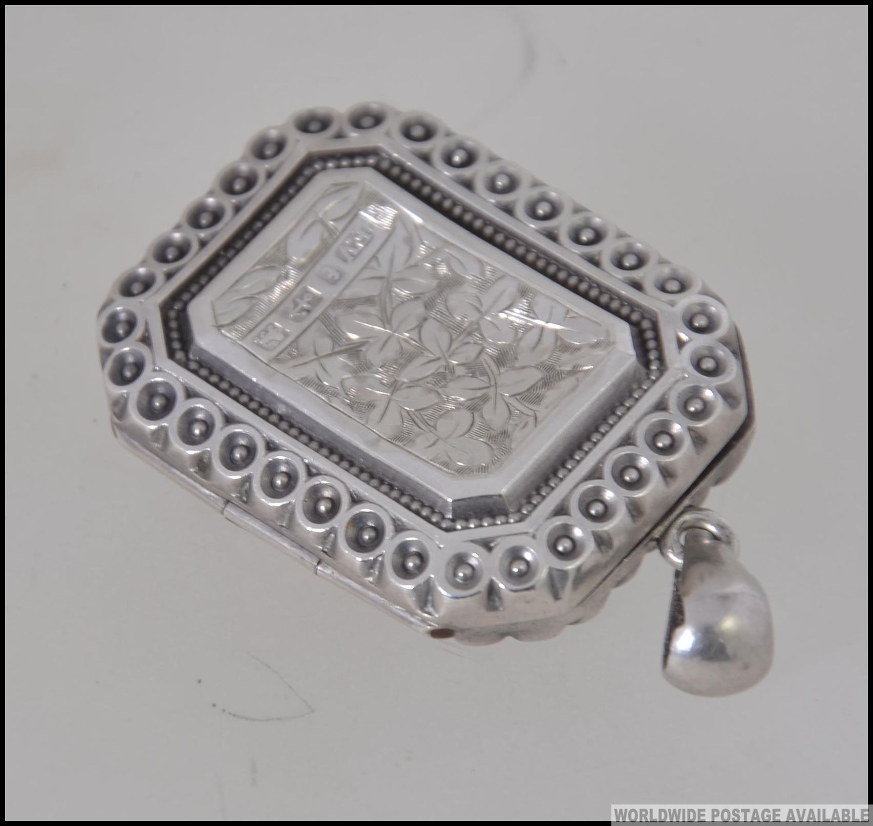 A Victorian silver locket of rectangular form with gilded bird being hallmarked for 1905, - Image 2 of 3