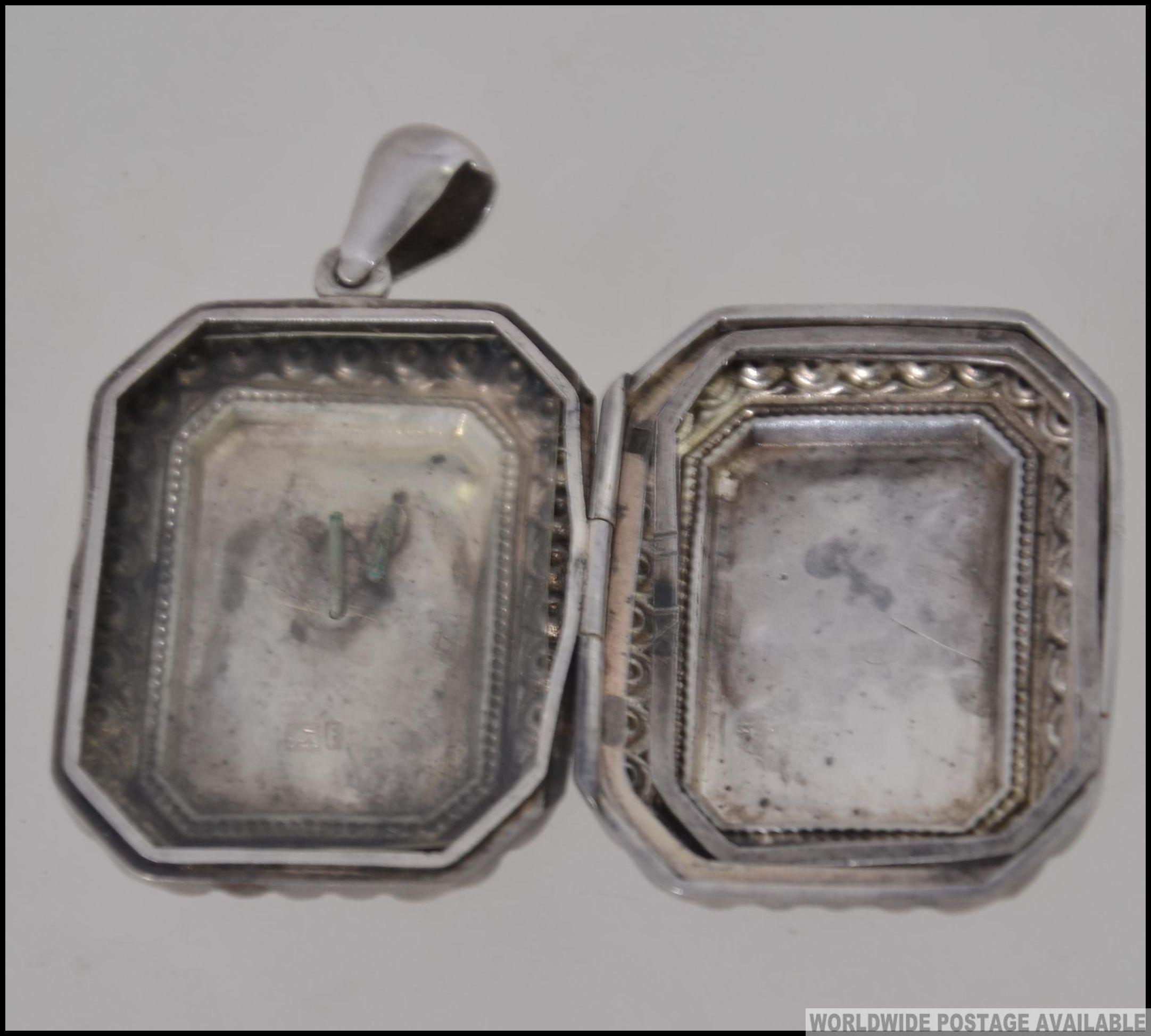 A Victorian silver locket of rectangular form with gilded bird being hallmarked for 1905, - Image 3 of 3