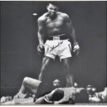 A personally signed black and white photograph of Mohammed Ali being limited edition 32 / 50.