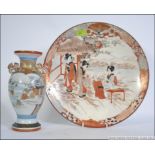 A late 19th early 20th century Japanese Satsuma ware wall charger with applied Geisha girls to the