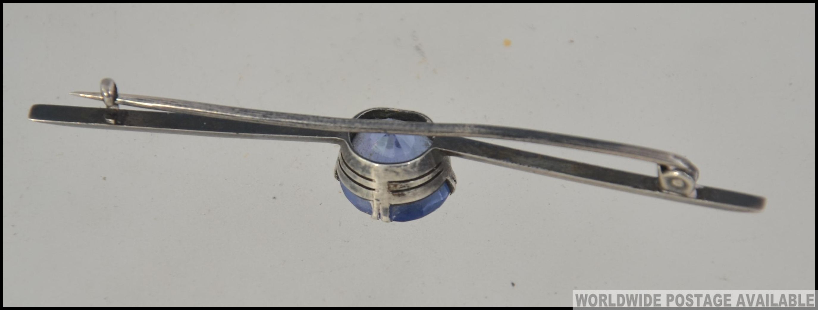 A Ladies Victorian pin bar brooch set with a believed ceylon blue sapphire. Weight 4. - Image 2 of 2