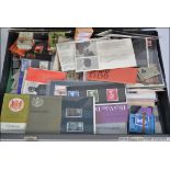 A good collection of presentation packs dating from the 1960's along with several books of unused