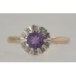 A vintage hallmarked 9ct gold amethyst and diamond ring.