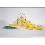 A Wade Heath Walt Disney Licensed childs tea service complete with the teapot together with a