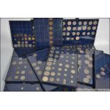 A good collectors case with 12 trays containing unusual mixed coinage such as Indian Anna's ,