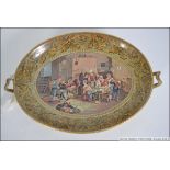 A Pratt ware dish circa 1860 printed with ' The Blind Fiddler ' pattern after Sir David Wilkie.