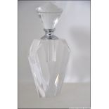 A 20th century art deco style perfume bottle having a screw top glass stopper with attached dabber.