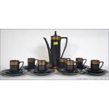 A retro 20th century Portmeirion tea / coffee service in a decorative design having cups, saucers,
