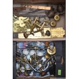 A large box of brass hinges, caubels, handles and latches,