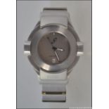 A Storm Friction wristwatch set in stainless steel heavy set case and bracelet,