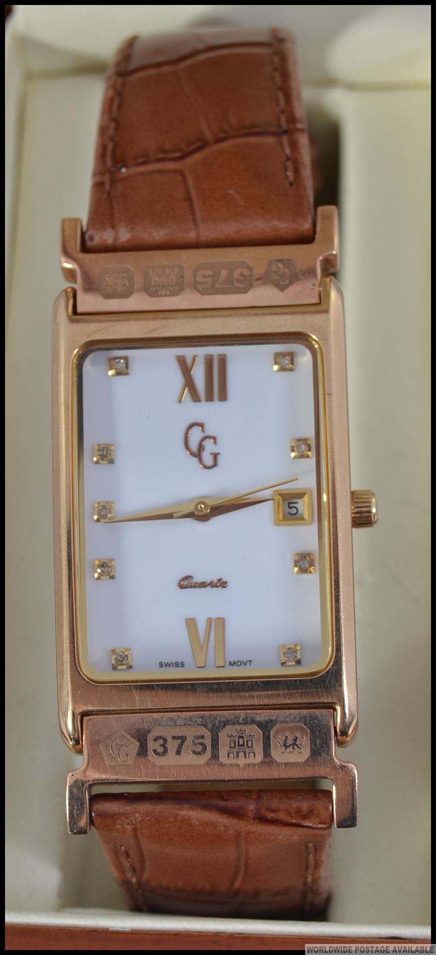 A hallmarked 9ct Welsh gold and diamond Clogau watch with original box and case.
