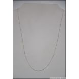A 9ct white gold Italian fine chain linked necklace measuring 59cms long with bale and clasp. 0.