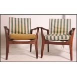 A stunning pair of Danish teak armchairs