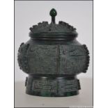 A 20th century Chinese bronze lidded cen