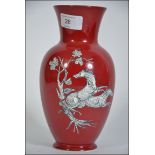 A Red Ground Crown Devon Pottery Flower Vase With Horse And Blossom Design H23cm