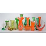 A collection of retro studio green glass to include vases,