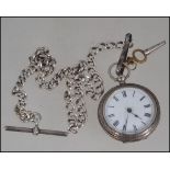 A white metal , ( stamped ' Warranted 800 silver ' )pocket watch , chain and key .